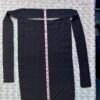 Black niqab with a measuring tape