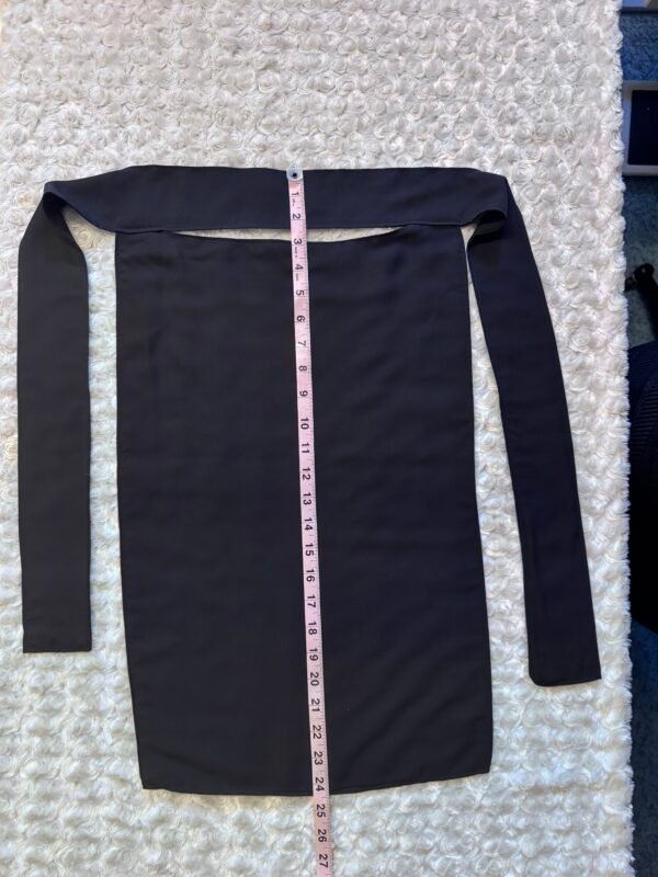 Black niqab with a measuring tape